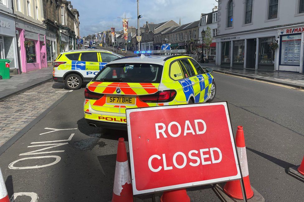 Police at the scene of the incident in Lanark