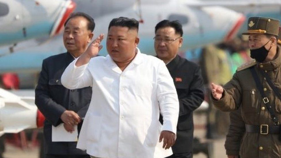 Kim Jong-un (centre) inspects North Korea's Air Force units on 12 April 2020