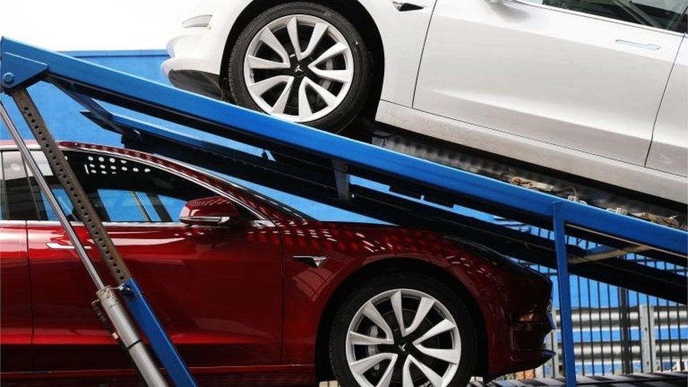 Tesla cars on a delivery lorry