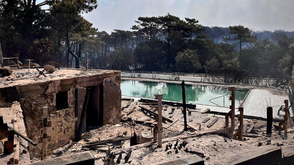 The swimming pool at a camping site of Dune du Pilat destroyed by a major fire near La Teste-de-Buch forest