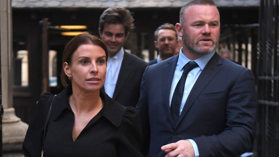 Coleen Rooney, pictured with Wayne Rooney outside court, is being sued for libel