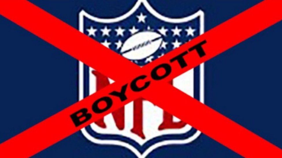 A NFL logo with a red cross though it and the word 'boycott'