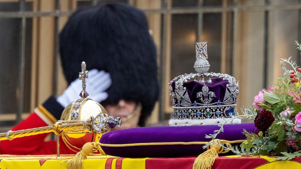 The crown on top of the Queen's coffin