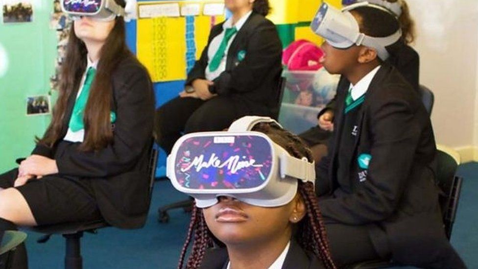 Children with VR headsets on