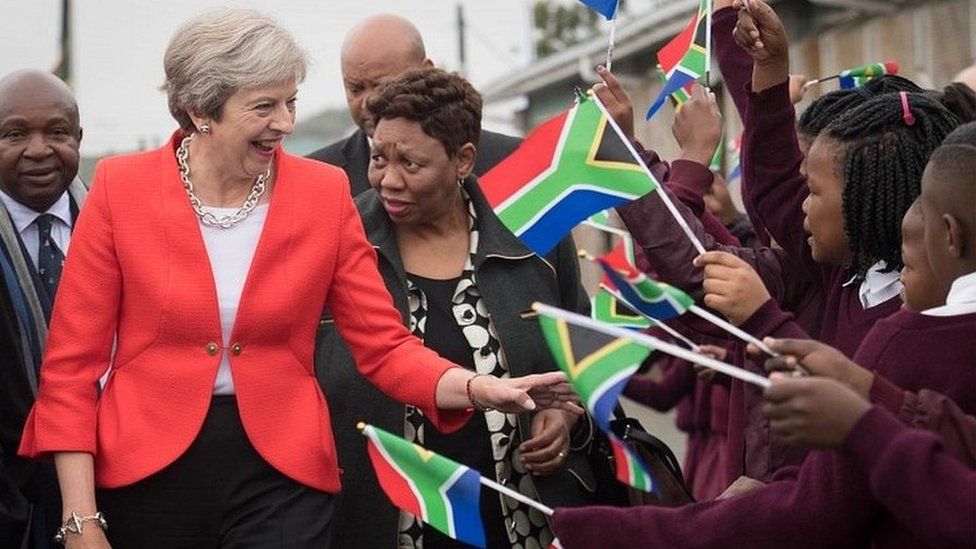 Theresa May meets students at I.D. Mkize Secondary School in Cape Town, which is twinned with Whitby High School in Yorkshire
