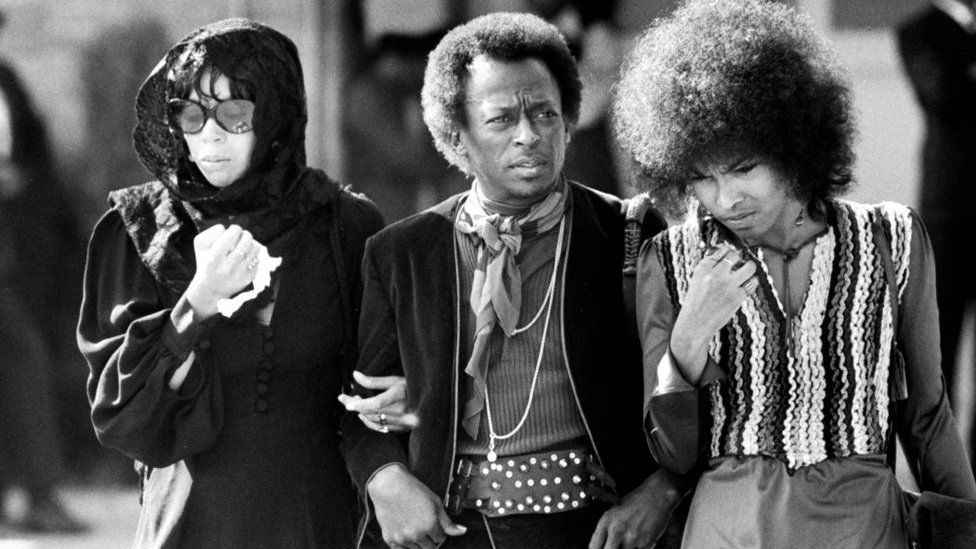 Betty Davis (left) and her husband miles at the funeral of rock guitarist Jimi Hendrix