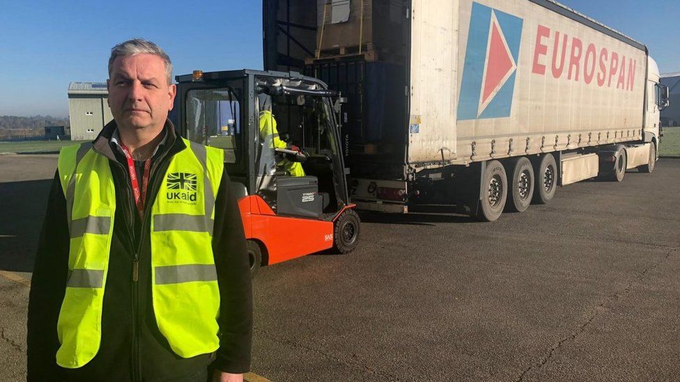 Charlie Mason standing outside a truck