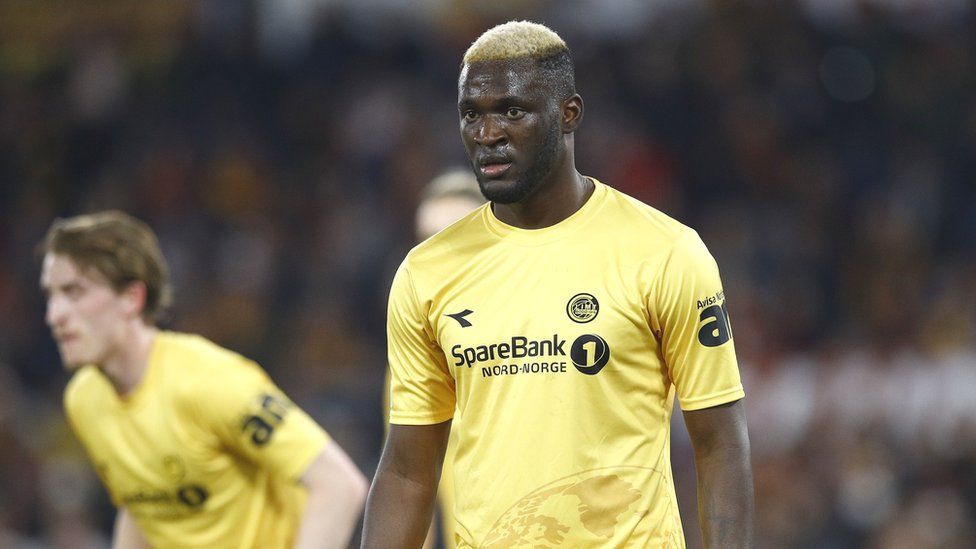 Victor Boniface in yellow kit plays for Bodo/Glimt