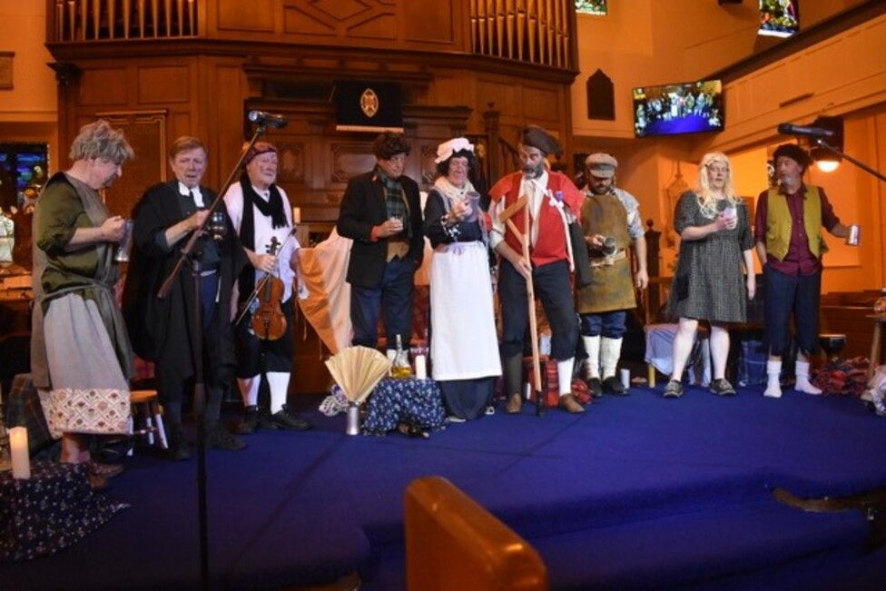 people performing The Jolly Beggars by Robert Burns