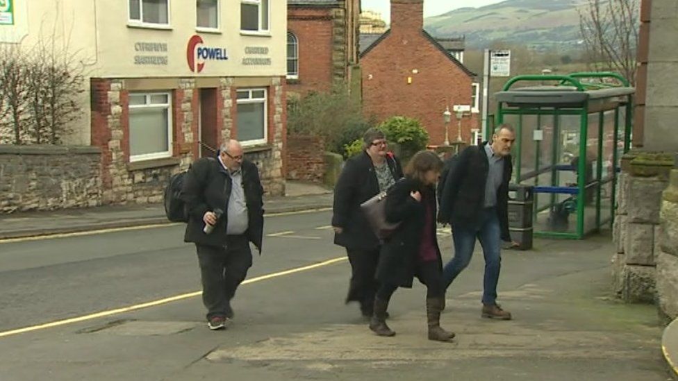 Mr Hughes' family arriving at the court