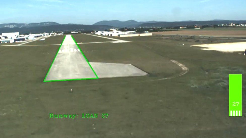 A computer pilot's view of the runway on approach