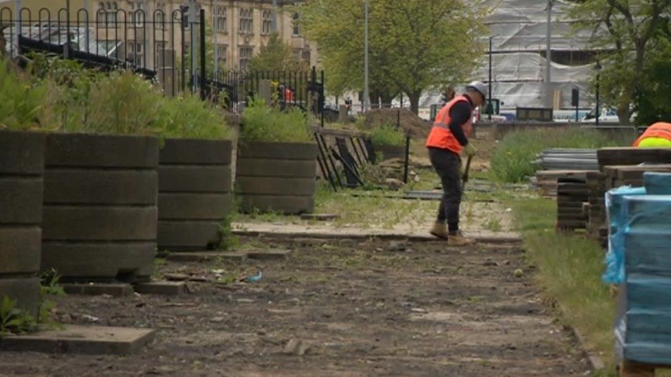 Worker on site in Queens Gardens