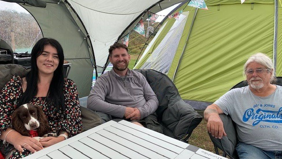 campers in tent