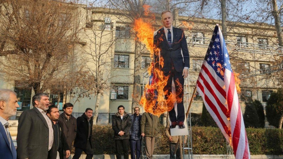 Cut-out of Britain"s ambassador to Iran Rob Macaire being bured in Tehran, 14 Jan