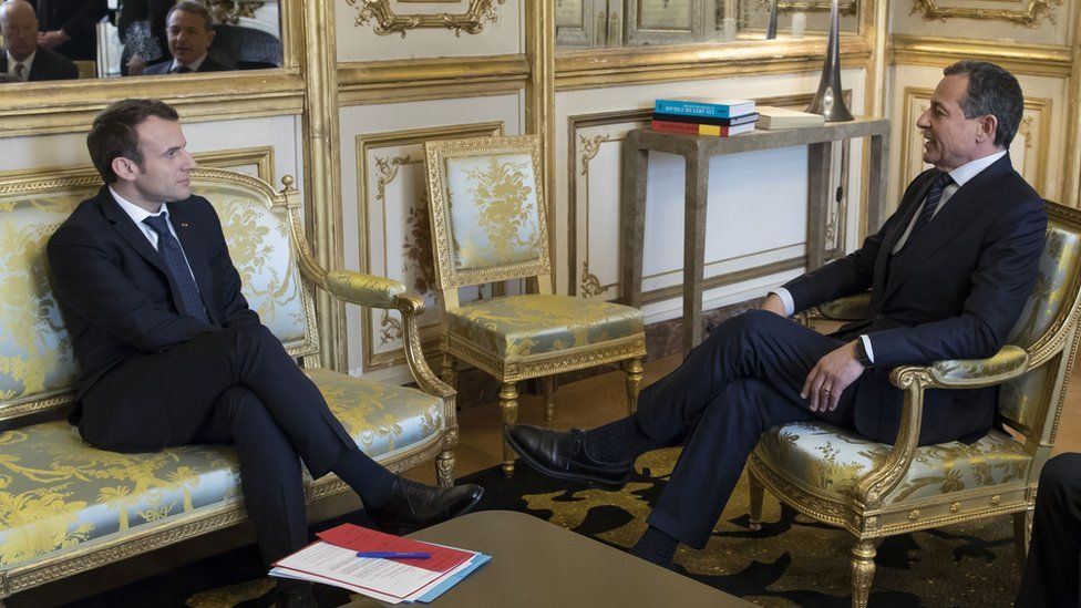 French president Emmanuel Macron (L) holds a meeting with Disney chief executive Robert Iger at the Elysee Palace in Paris, on February 27, 2018.