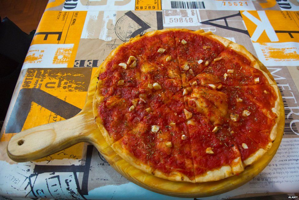 A classic Marinara pizza - with a tomato base and fresh garlic