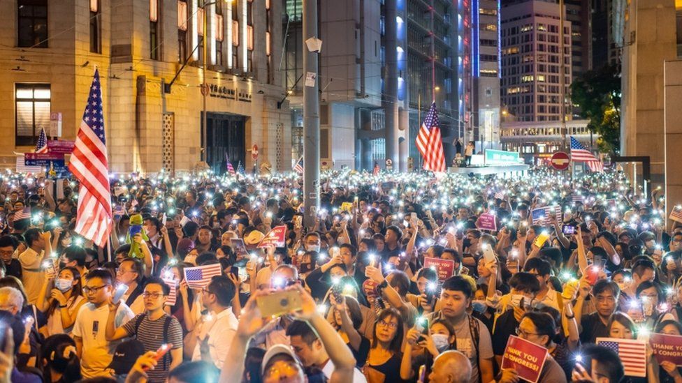 Thousands of protesters rallied on Monday in support of the Hong Kong Human Rights and Democracy Act