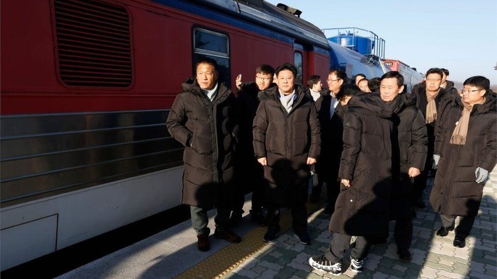 South Korea experts stand next to the train in Paju station (30 Nov 2018)