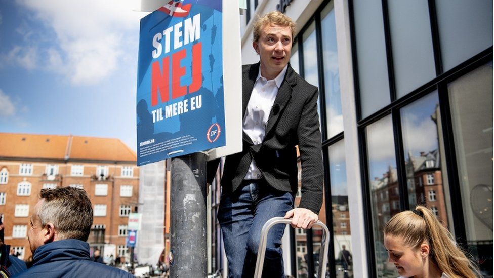 Chairman of the Danish People"s Party Morten Messerschmidt hangs posters against Danish referendum on Amagerbro in Copenhagen, Denmark, 07 May