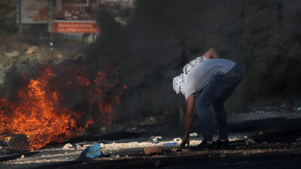 Palestinian protester near Ramallah (18 May)