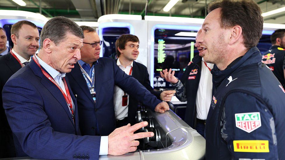 Dmitry Kozak (left), Russia's deputy prime minister talks to Red Bull racing team principal Christian Horner during qualifying for the Sochi grand prix on 30 April 2016