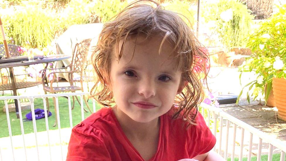 4-year-old Willow standing in her garden in Ansty