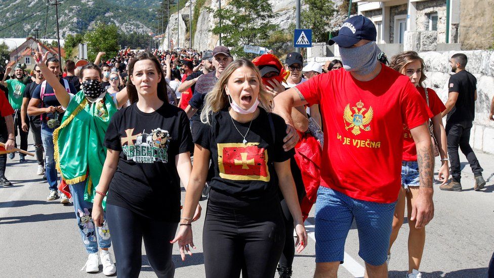 Demonstrators take part in a protest against enthronement of Bishop Joanikije in Cetinje