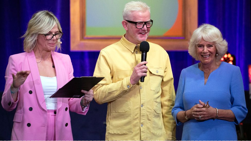 Radio 2 breakfast host Zoe Ball with her predecessor Chris Evans and the Queen Consort