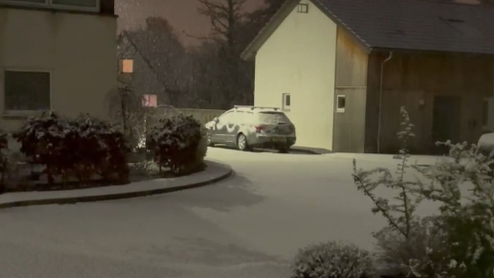 Forecasters officially declared a white Christmas with snow falling across parts of Scotland - including Aviemore