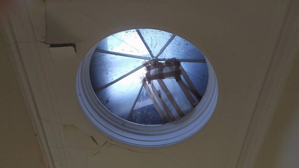 Damaged skylight in a Edinburgh Rent property that was lived in by Hailey La Sarre and Gergely Farkas
