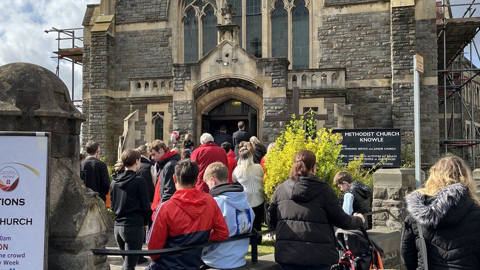 Crowds outside the church