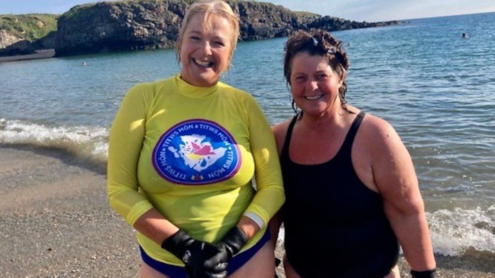 Women after swim in the sea