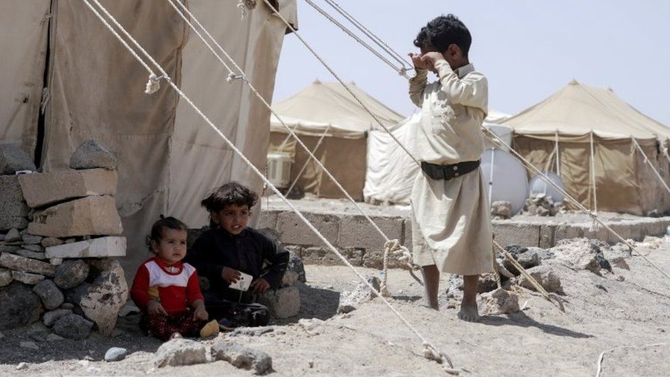 Children are pictured at a camp for internally displaced people on the outskirts of Marib city, Yemen (16 October 2021)
