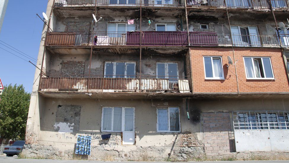 An apartment block in Tskhinvali still bears the scars of war