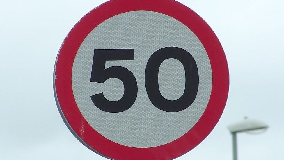 A sign reading 50mph
