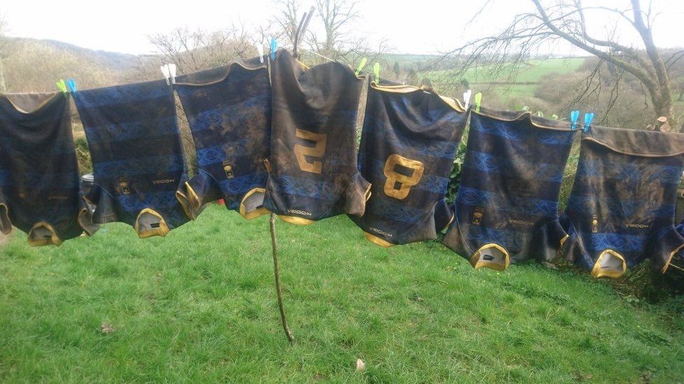 Rugby shirts on washing line