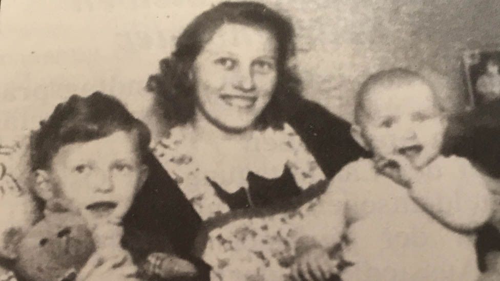 Christa Nolte as a baby with her mother and her brother