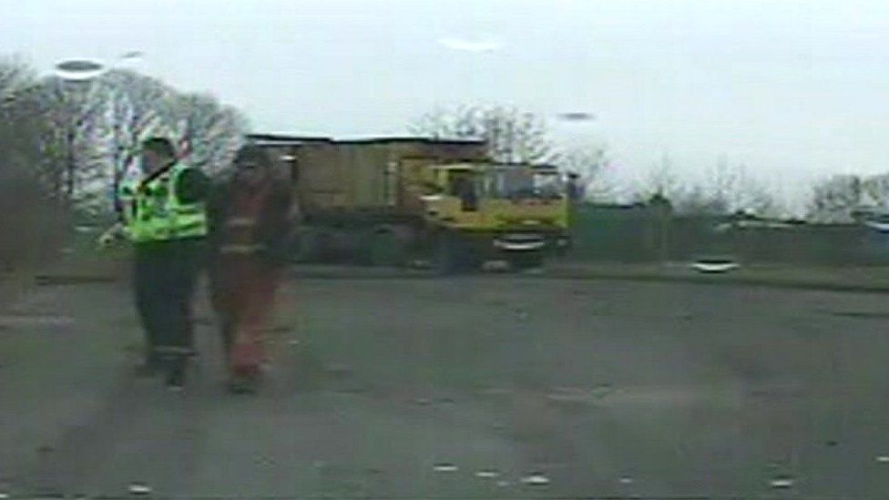 Francis Heaton being arrested for fly-tipping in Oldham