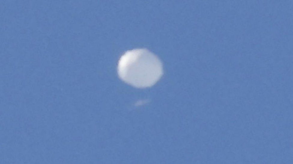 A high-altitude balloon, which the US government has stated is Chinese, is seen as it continues its multi-day path across the Northern United States in Charlotte, North Carolina, USA, 04 February 2023. US Secretary of State Blinken postponed a planned trip to China following the discovery of the balloon. The Pentagon said that the maneuverable Chinese surveillance balloon was posing 'no risk to commercial aviation, military assets or people on the ground'.