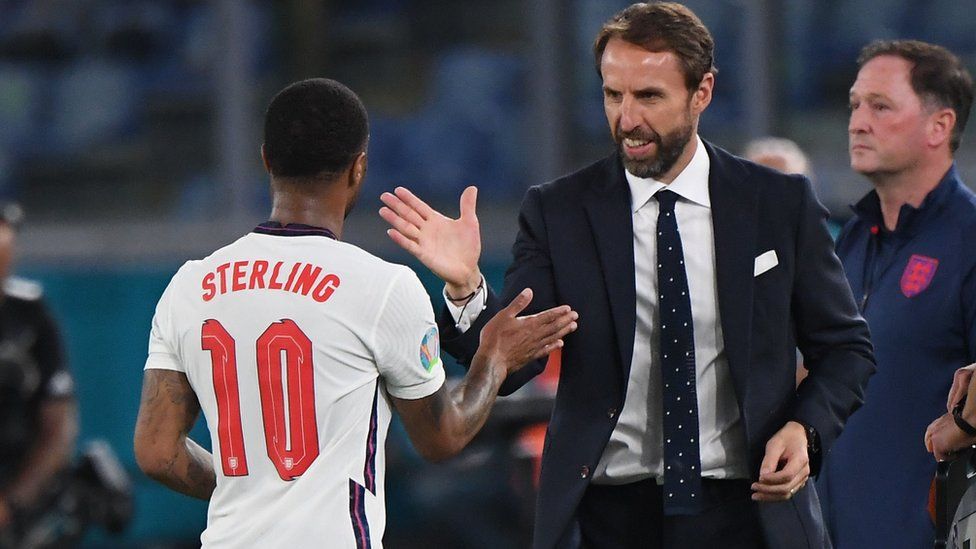 England"s Raheem Sterling shakes hands with England manager Gareth Southgate
