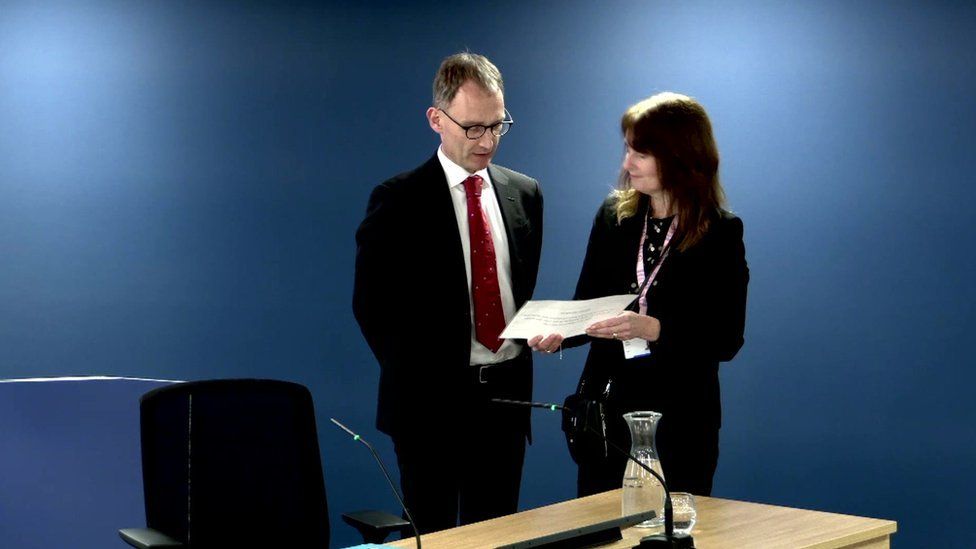 Prof Neil Ferguson being sworn in