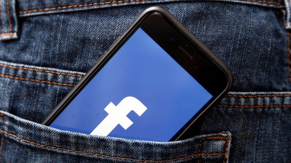 The Facebook symbol on a mobile phone