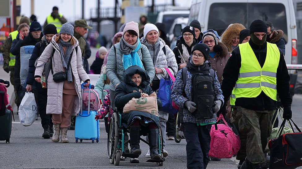 Women, children and older people at the border from Ukraine in to Korczowa in Poland