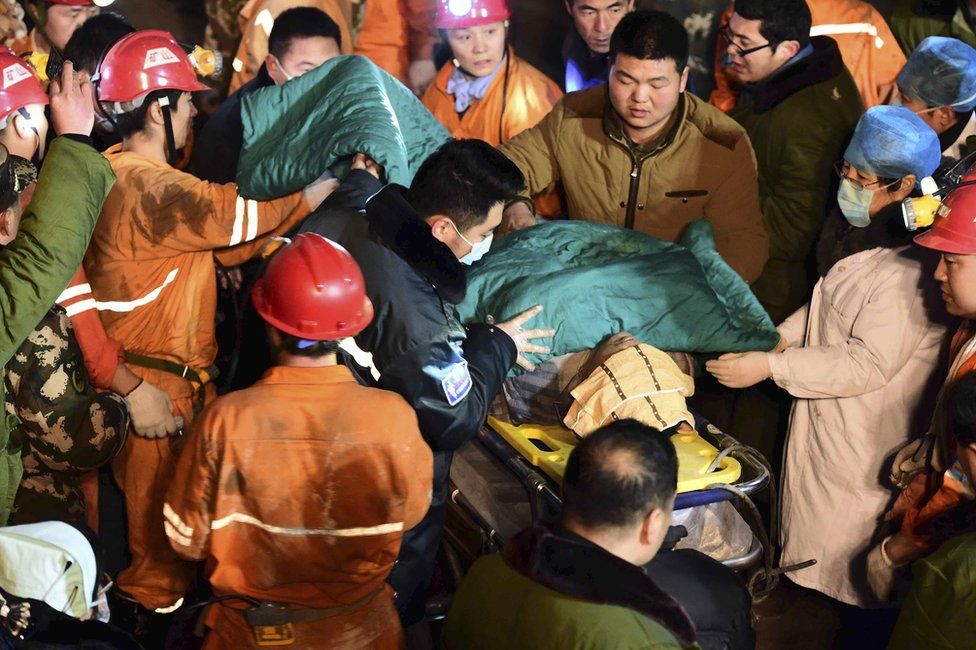 In this 25 December 2015 photo released by China"s Xinhua News Agency, a trapped miner is rescued from a collapsed gypsum mine in Pingyi County, east China"s Shandong Province.