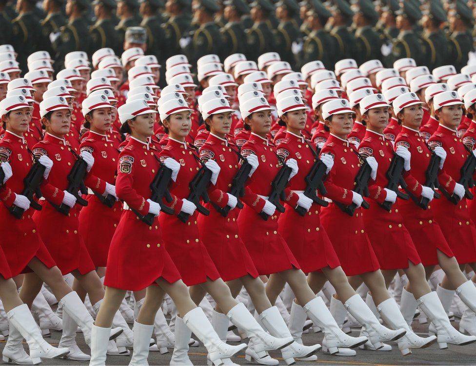Chinese women troops march during a military parade in Tiananmen Square in Beijing on 1 October 2019 marking the 70th anniversary of the founding of the People's Republic of China.