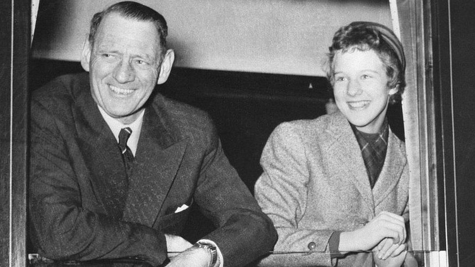 Then-Princess Margrethe smiles in a photo with her father, King Frederick IX