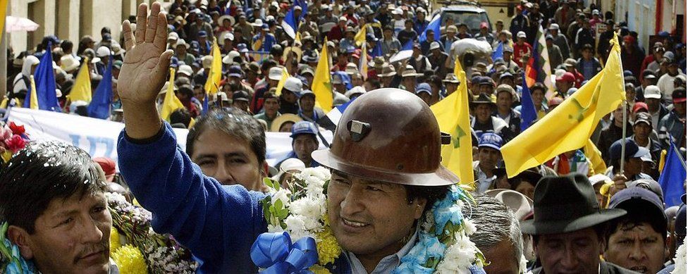 Evo Morales waves to supporters in Oruro, Bolivia, in October 2005 during a his presidential election campaign