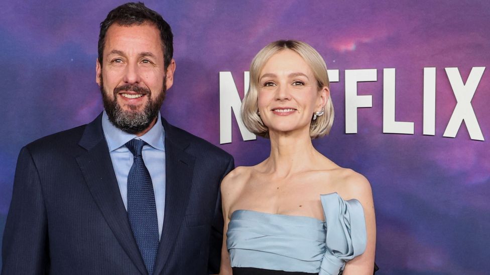 Cast members Adam Sandler and Carey Mulligan attend a special screening of the film Spaceman at The Egyptian Theatre in Los Angeles, California, U.S. February 26, 2024