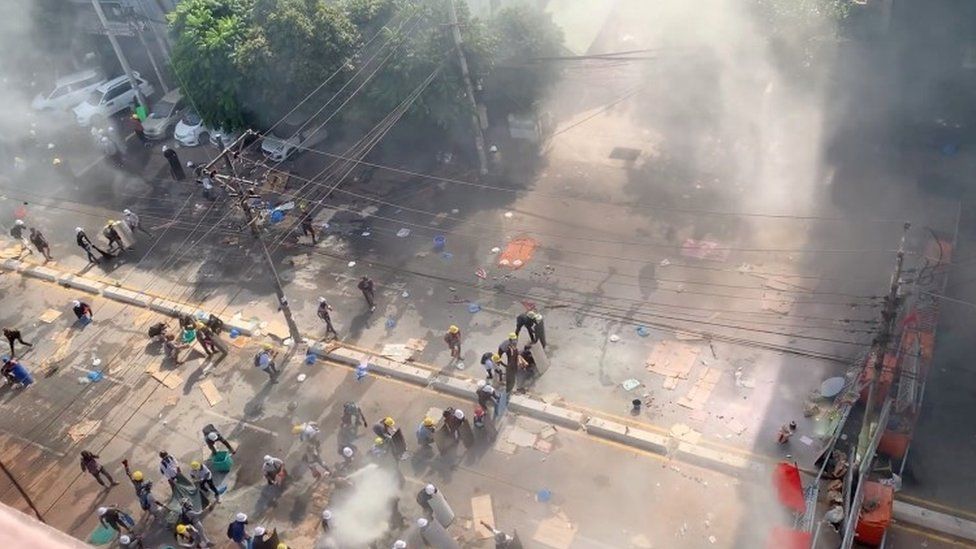 Tear gas and smoke bombs as protesters clash with police