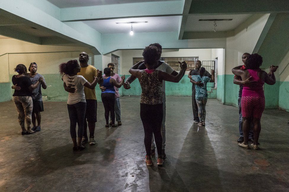 Dance classes held at night in a parking compound in "Favela" Vila do Metrô community, Mangueira, Rio de Janeiro, Brazil.